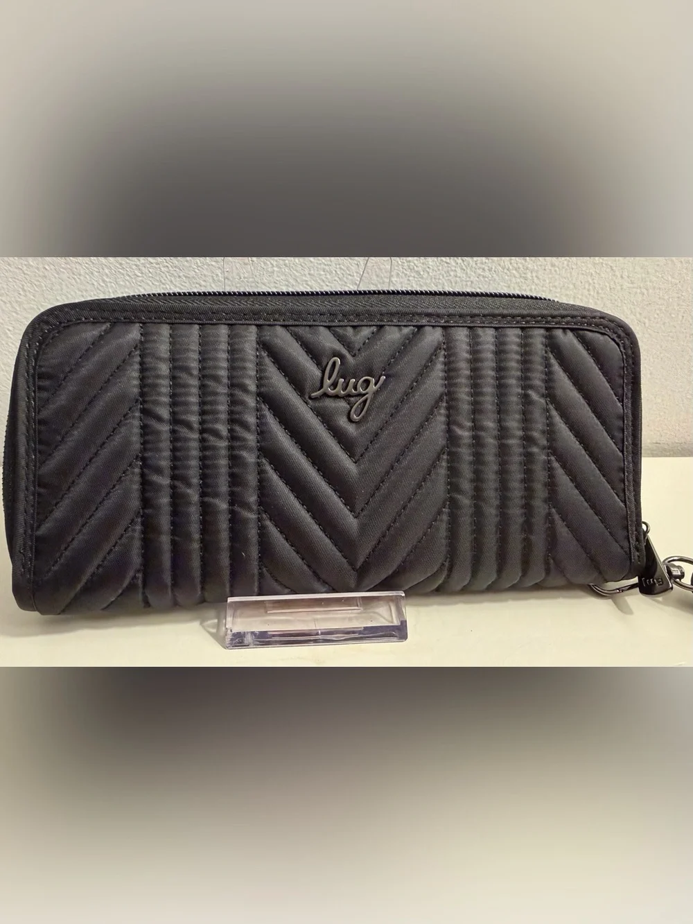 Lug Bags black Straddle Wristlet/Wallet with chevron quilted design on front